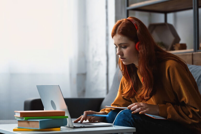 A student uses a laptop to study